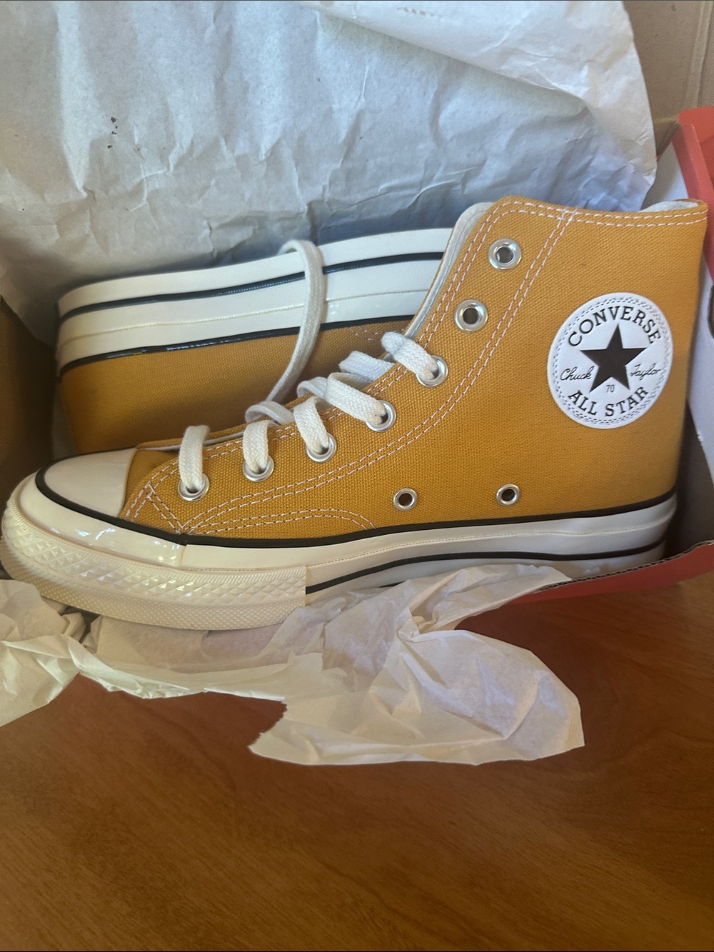 Converse women’s Chuck 70 High Top Sneakers in Mustard Yellow